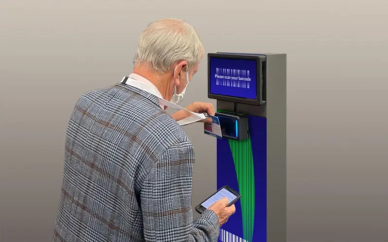 person scanning their badge at a ScanPod