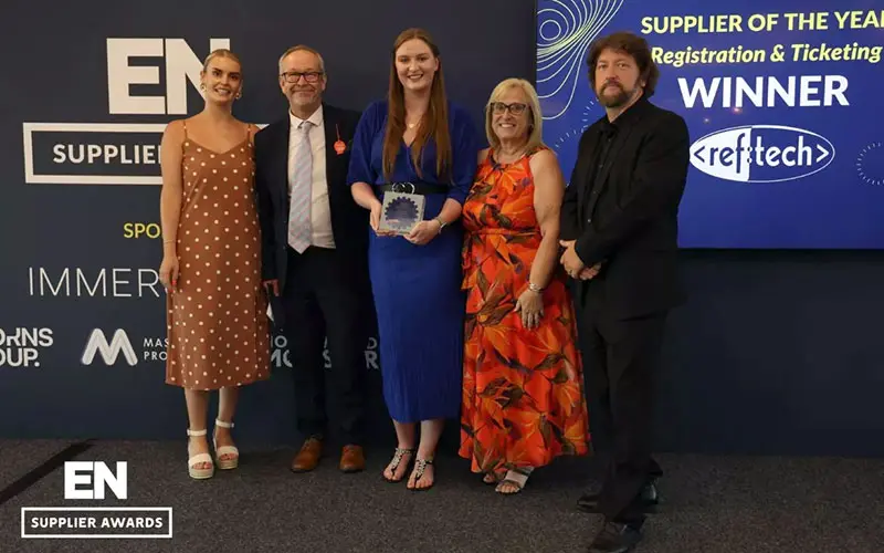 Collecting the award on stage