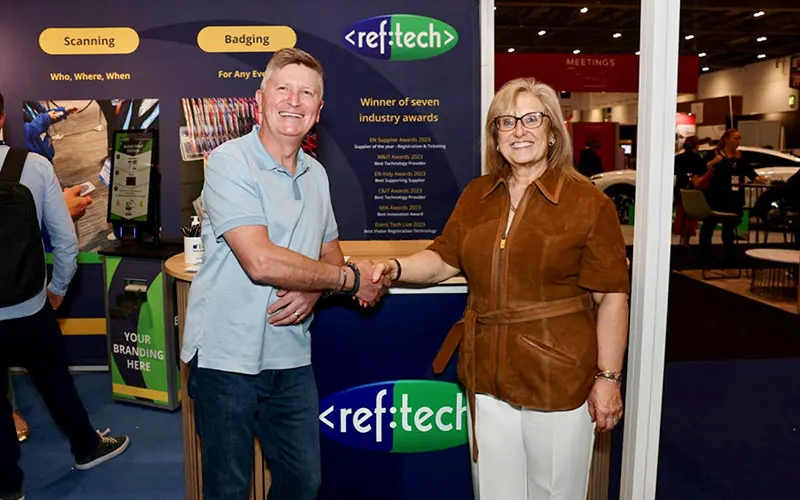 David Preston, CEO of Realise and Margaret Reeves, managing director of RefTech shaking hands