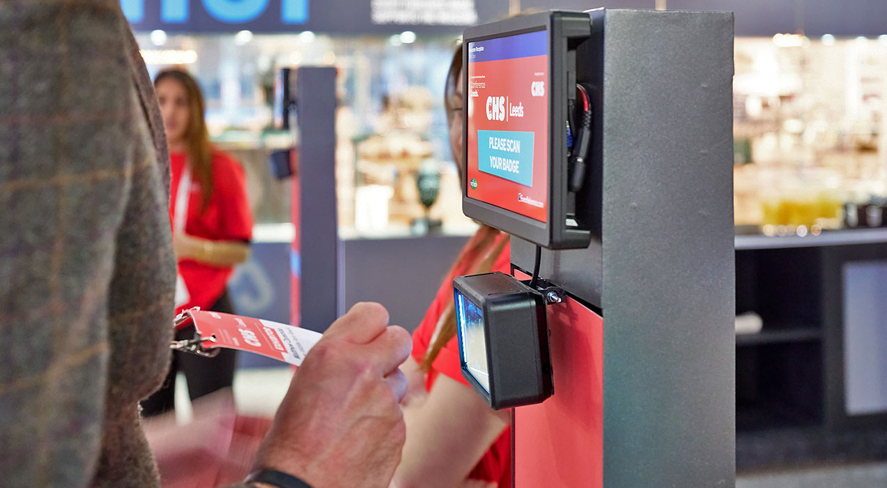 Person using a ScanPod to scan their badge at CHS Leeds